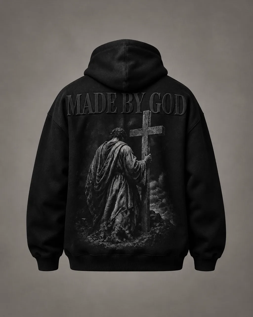 Black heavyweight hoodie with Made By God lettering and robed figure artwork