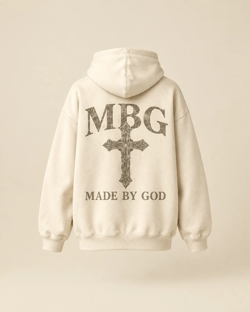 Ivory oversized hoodie with MBG, a gothic cross, and Made By God lettering